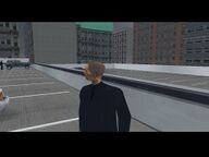 Yakuza co-leader Kenji Kasen standing on the top of the Newport multistory car park.