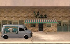 The Las Venturas location, with a Rumpo sporting the company's logo parked outside.
