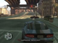 Niko Bellic chasing Oleg Minkov through Hove Beach as Minkov attempts to make his escape.