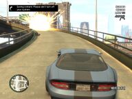 Niko Bellic watching as Oleg Minkov's car explodes, killing Minkov.