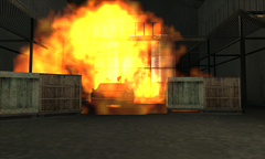 The car detonates and destroys the factory.