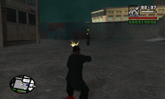 CJ fights his way out of the factory yard.